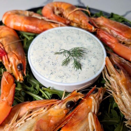 Smooth and creamy dill sauce, served next to whole king prawns atop a bed of rocket